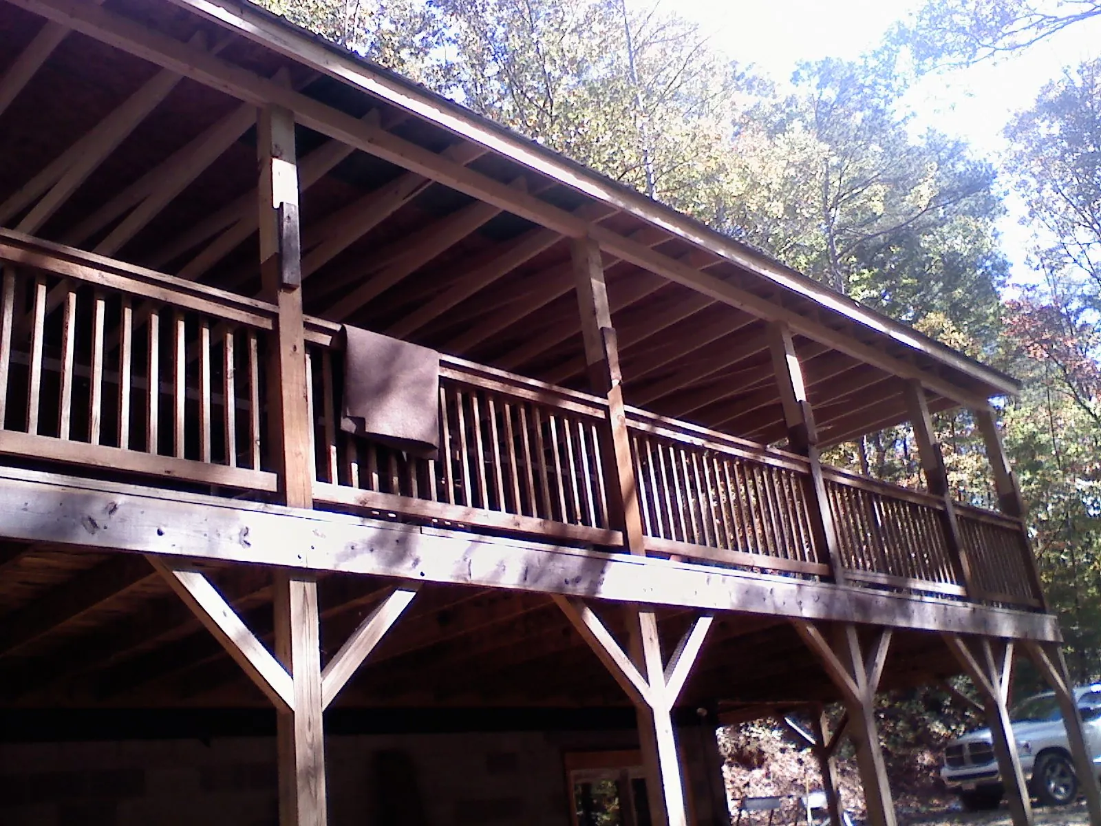 Timber framing under a new elevated porch and deck — Roof Leak Repair in Poseyville by Roofing Brothers